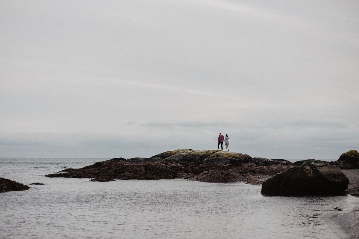 couple exploring oceanside on Vancouver Island